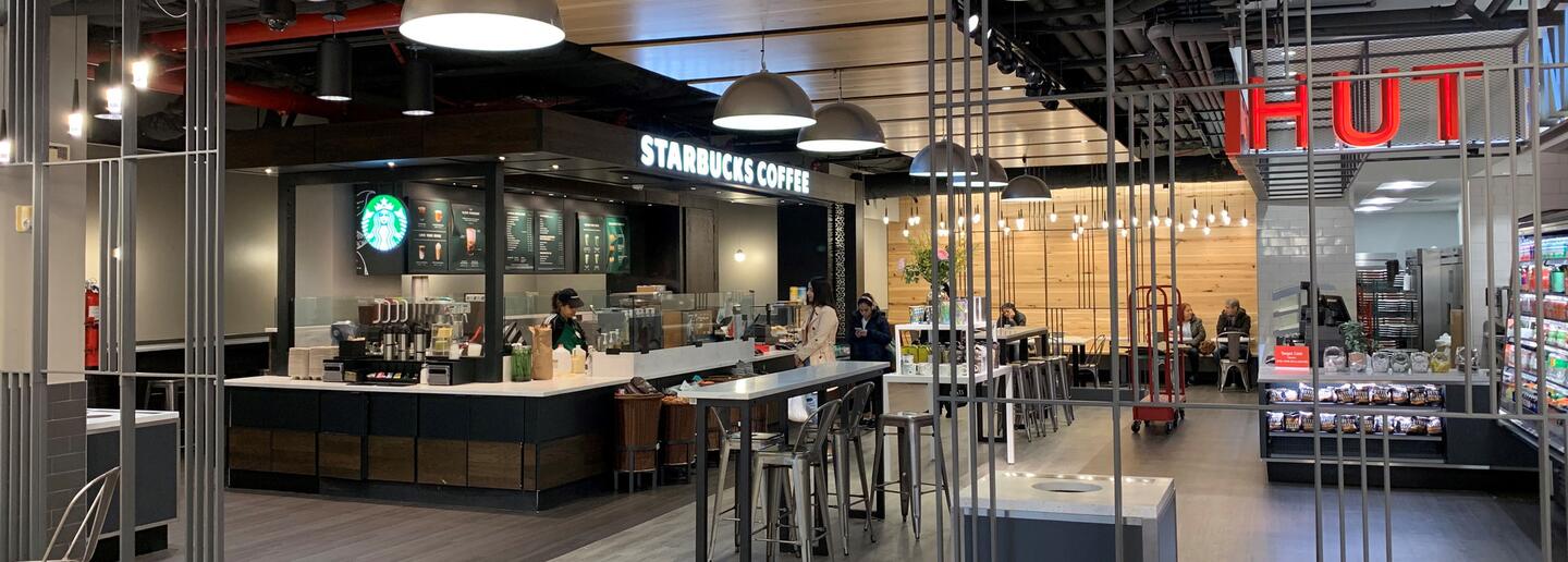 Modern food hall interior with commercial lighting